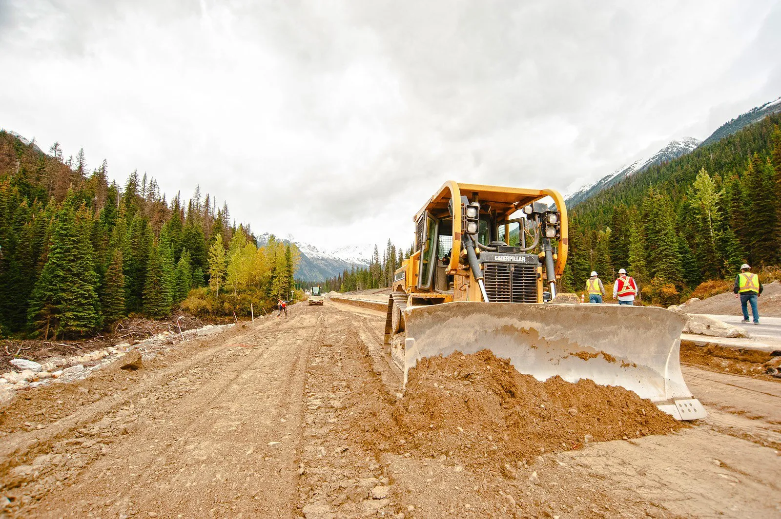 Grader working the widened Trans-Canada alignment through Rogers Pass